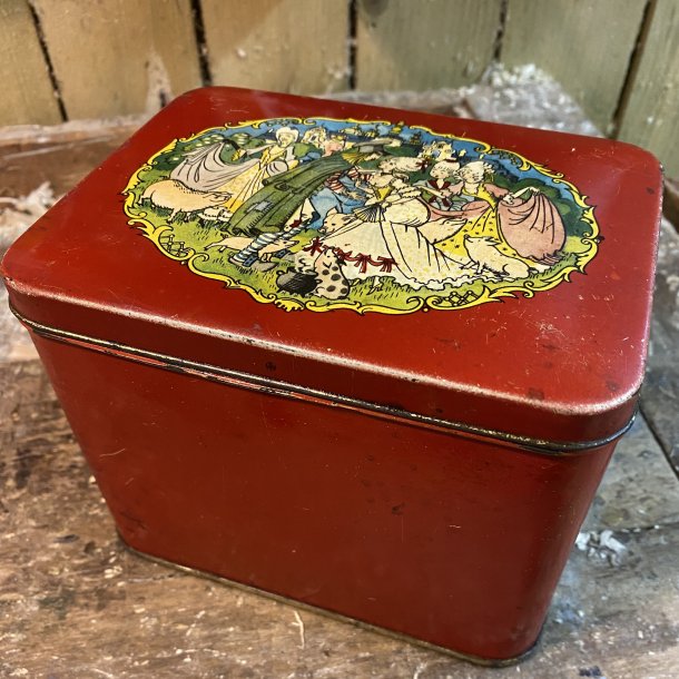 Gammel rd metaldse med motiv 