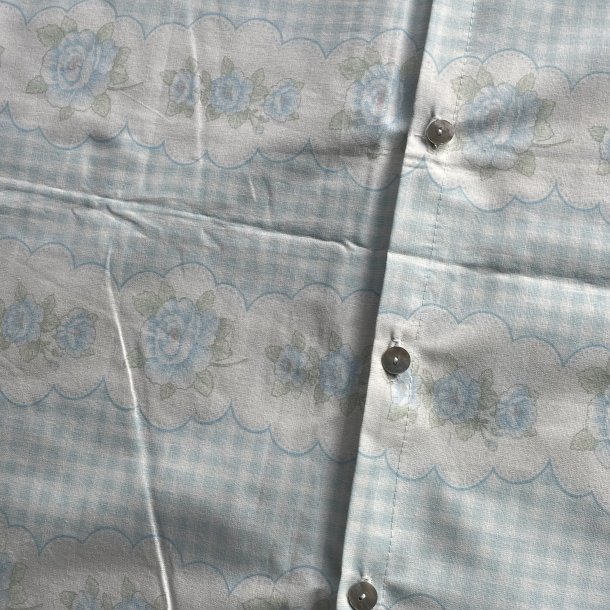 Blomstret pudebetr�k bl�/hvid 